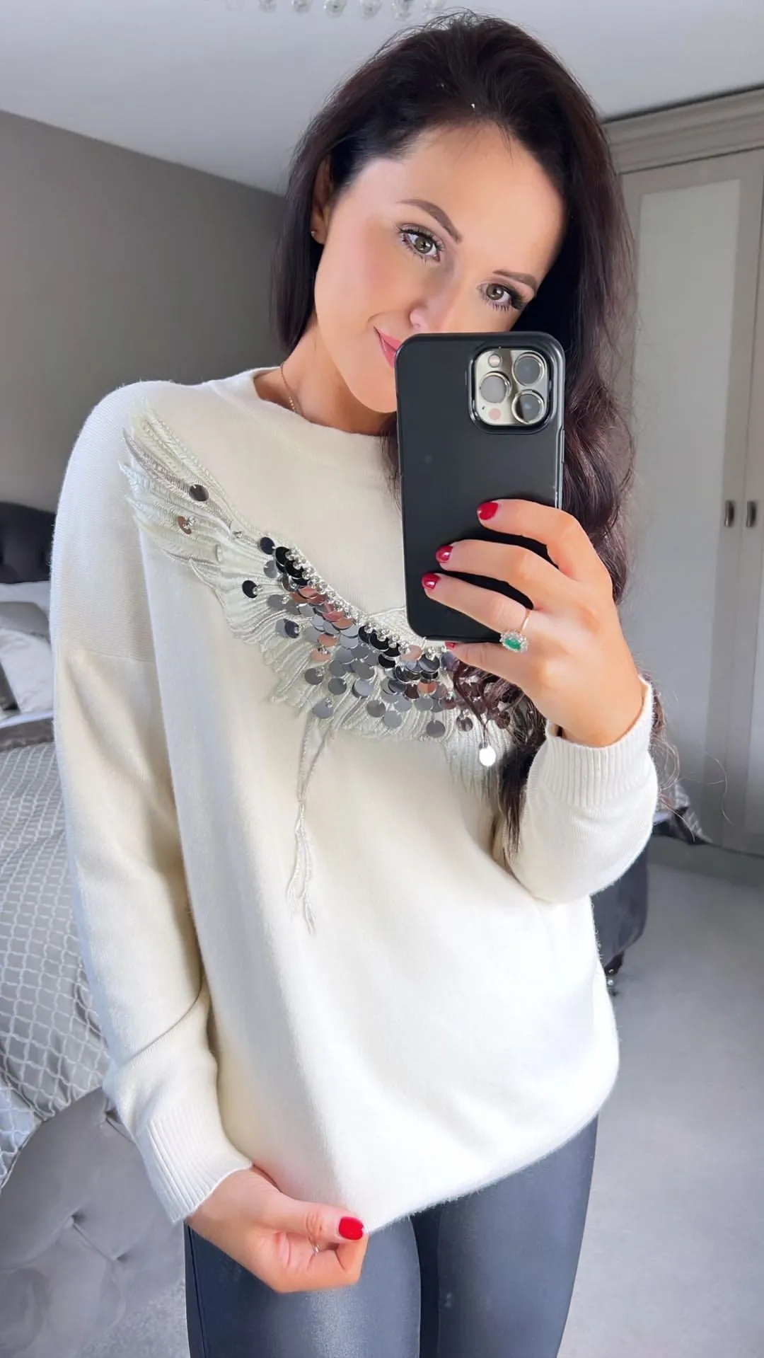 Embellished stork jumper