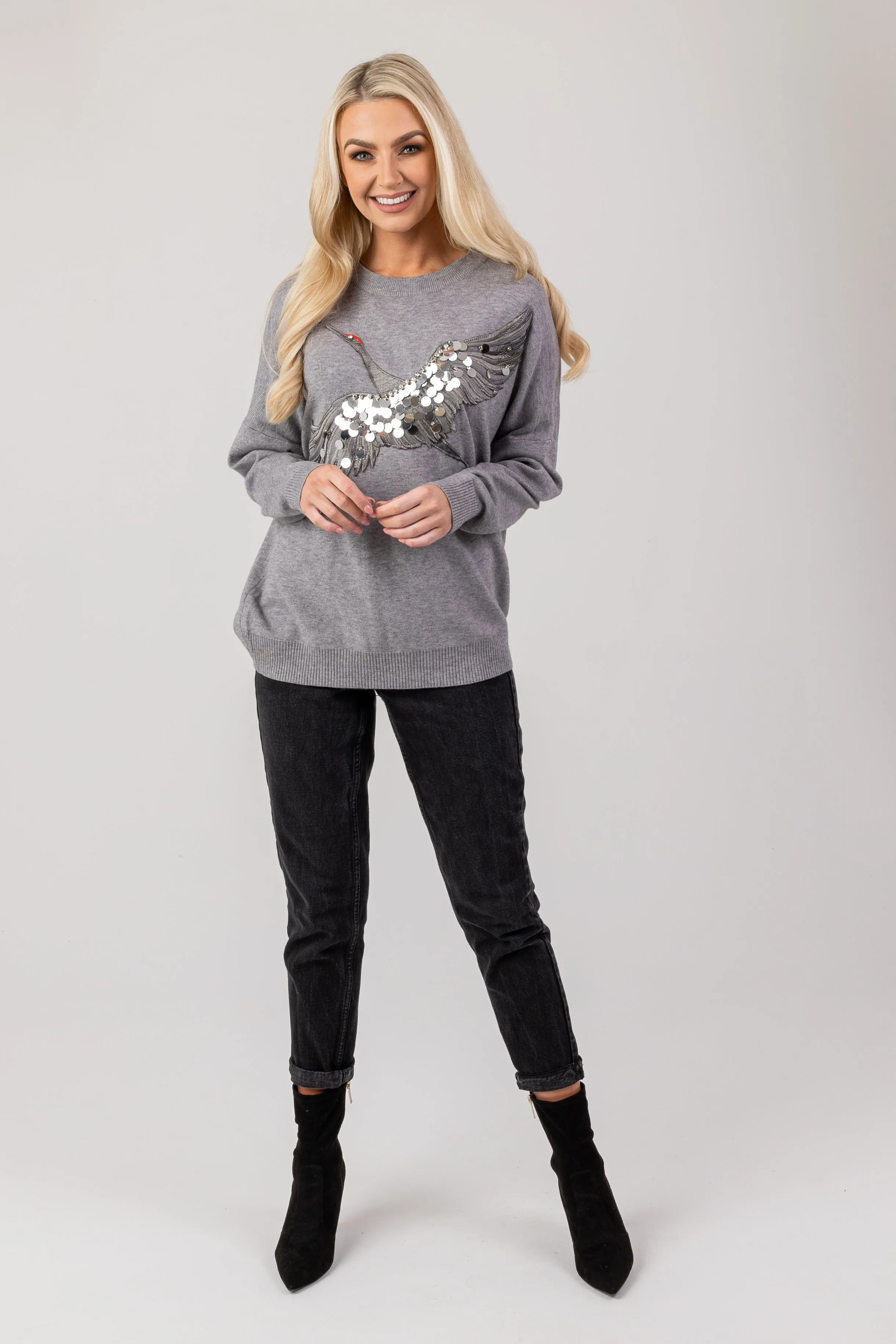 Embellished stork jumper